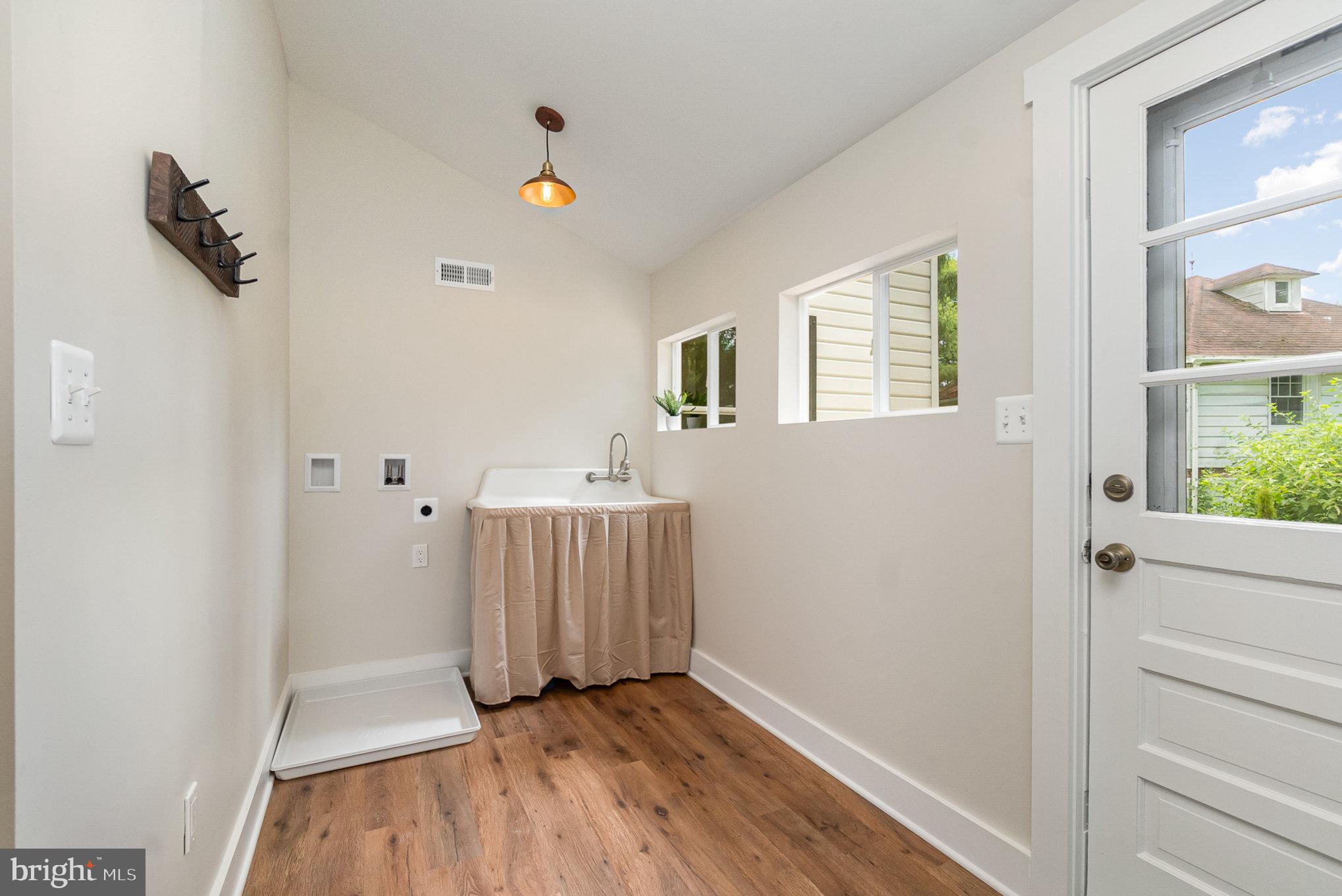 1702 High Point Road Forest Hill, MD 21050 - Photo 29 of 40 Main level laundry area with original farm sink.