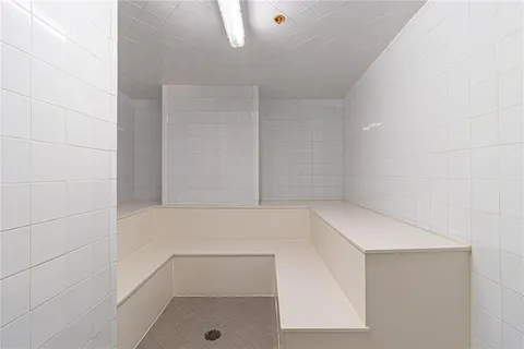 a kitchen with a stove and cabinets