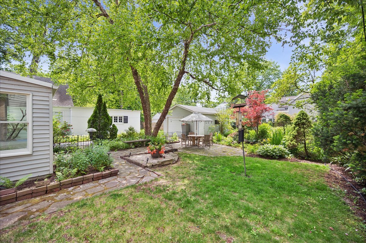 712 Juniper Road Glenview, IL 60025 - Photo 2 of 33 a view of a house with backyard and sitting area