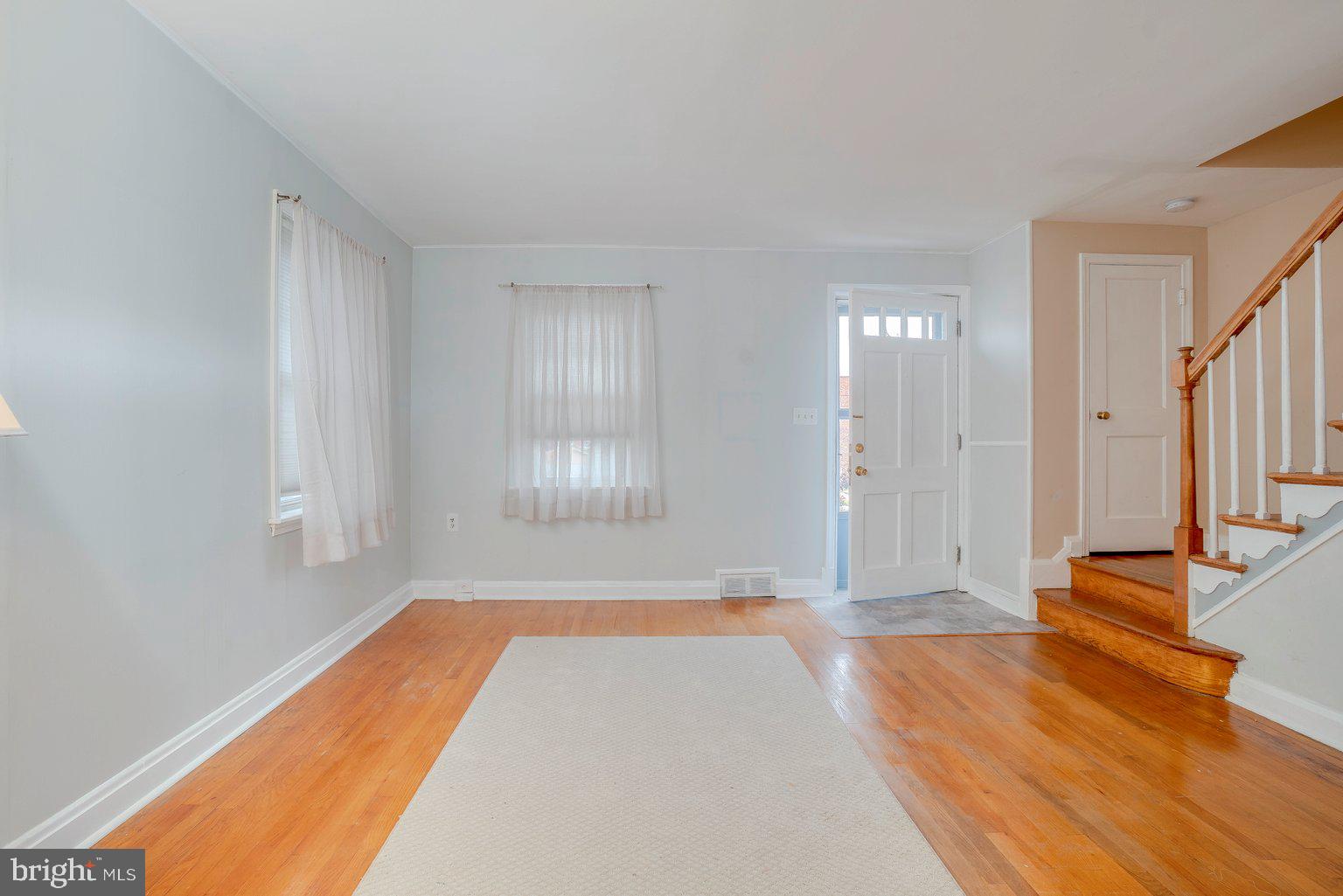 1769 Amuskai Road Baltimore, MD 21234 - Photo 10 of 37 View of LR from dining room. Closet on RT up steps