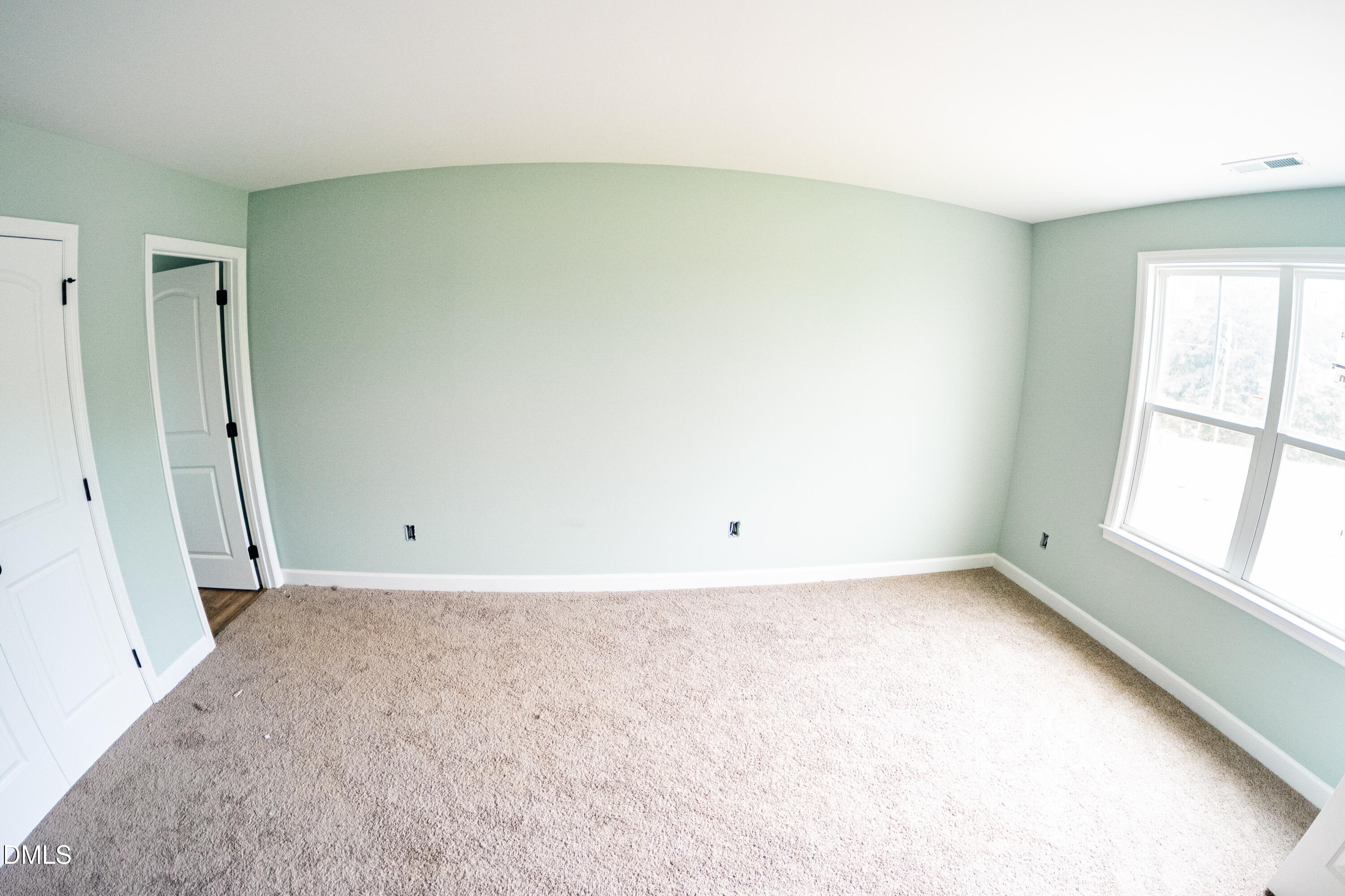 117 Wilson Street Erwin, NC 28339 - Photo 13 of 15 an empty room with a window