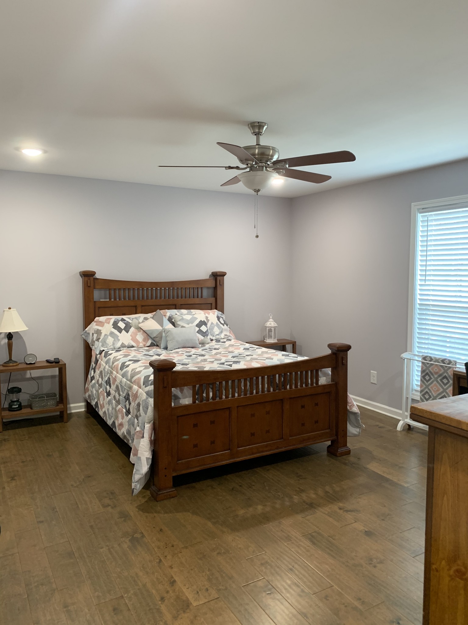 888 Prosser Road Leoma, TN 38468 - Photo 6 of 11 a bedroom with a bed and a chandelier