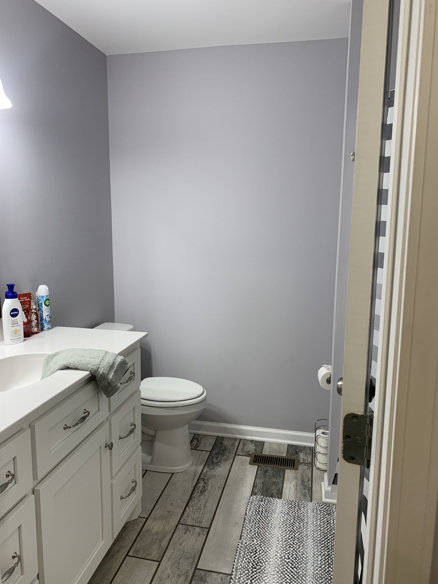 888 Prosser Road Leoma, TN 38468 - Photo 7 of 11 a bathroom with a granite countertop toilet and a sink