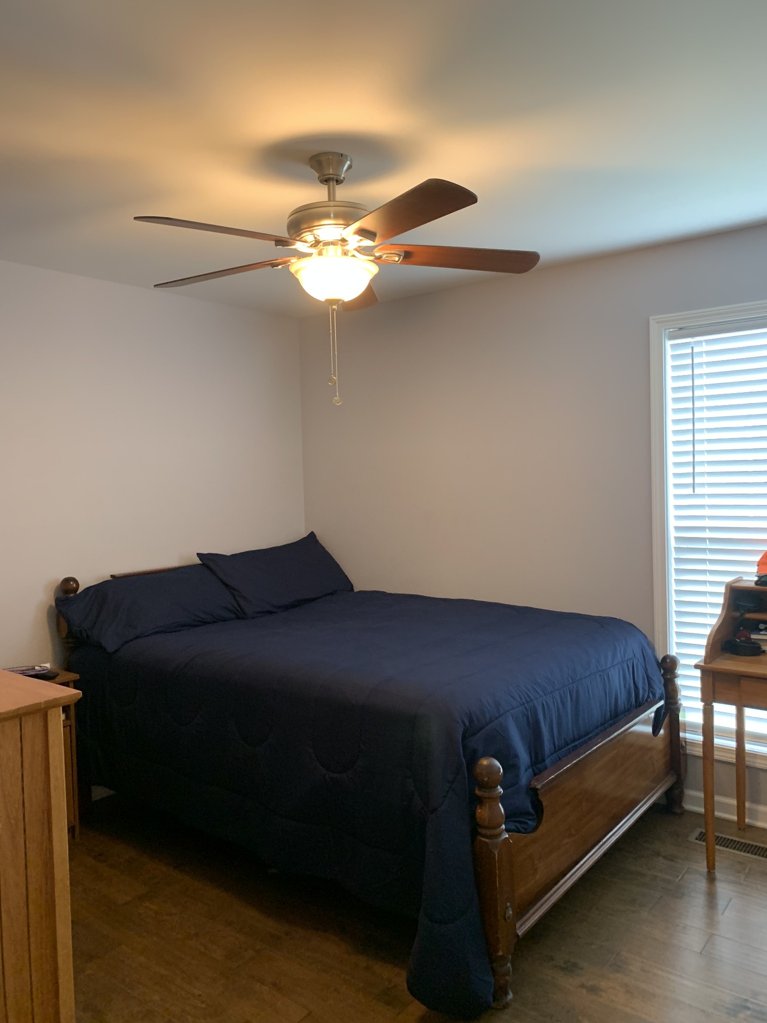 888 Prosser Road Leoma, TN 38468 - Photo 8 of 11 a room with a bed and a chandelier