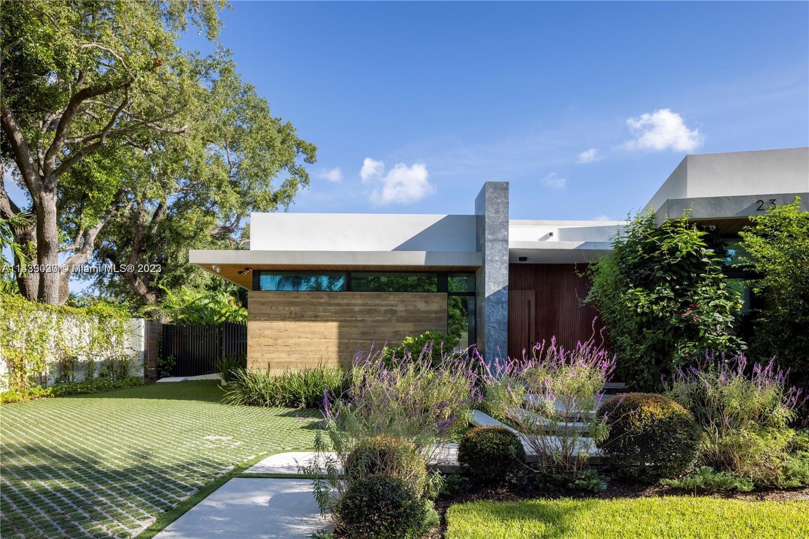 23 Samana Drive Miami, FL 33133 - Photo 3 of 19 a front view of a house with garden