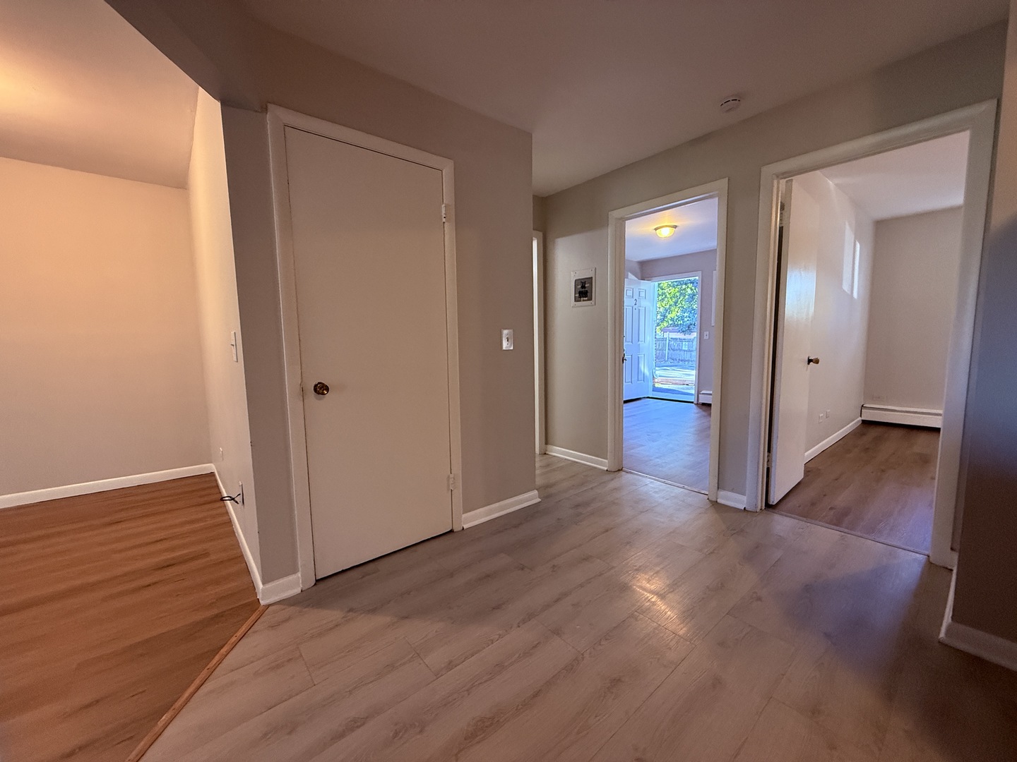 1119 East Algonquin Road, Unit 2 Arlington Heights, IL 60005 - Photo 8 of 13 a view of a hallway with wooden floor