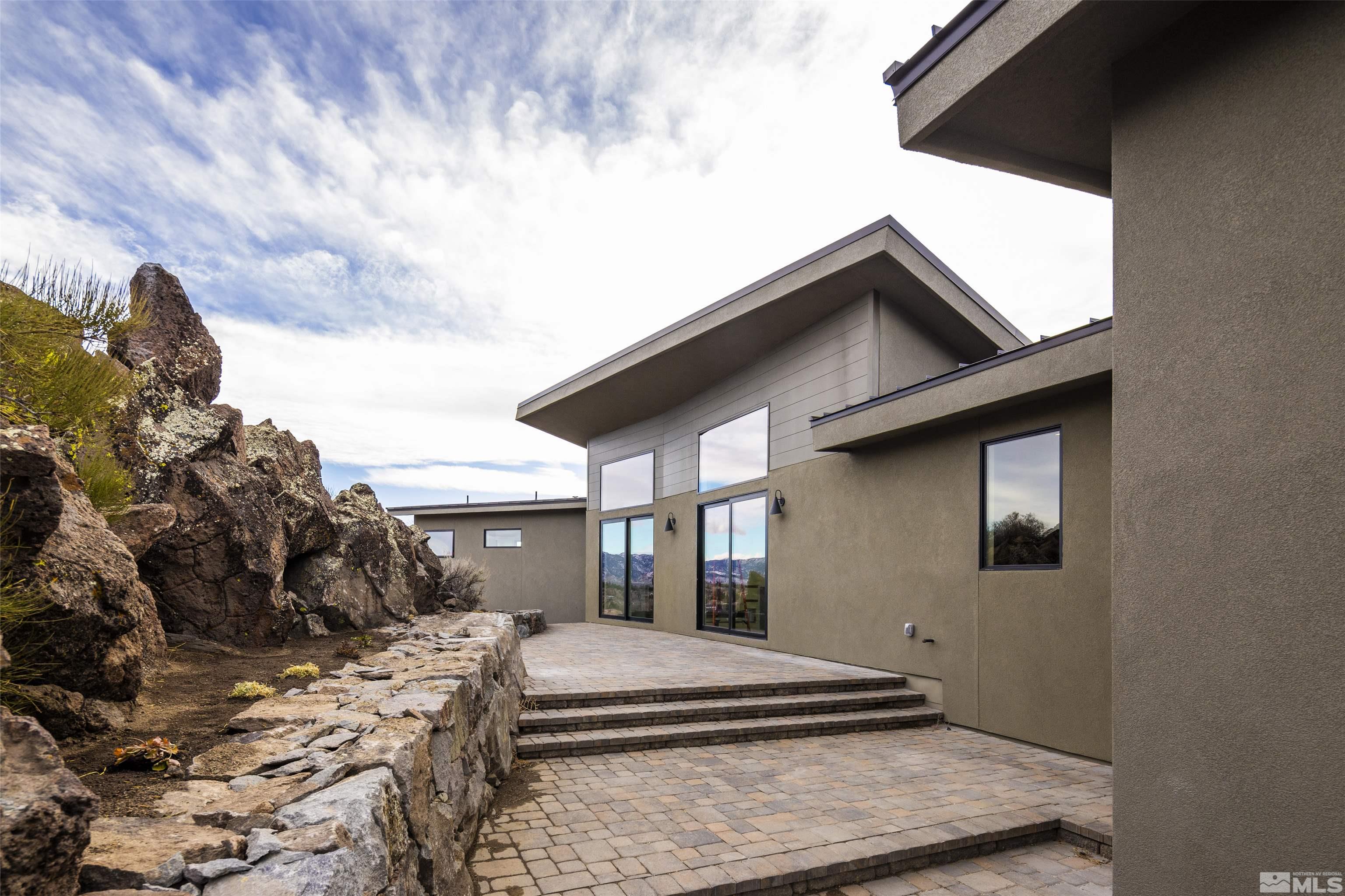 2331 Diamond J Place Reno, NV 89511 - Photo 20 of 25 a view of house with backyard