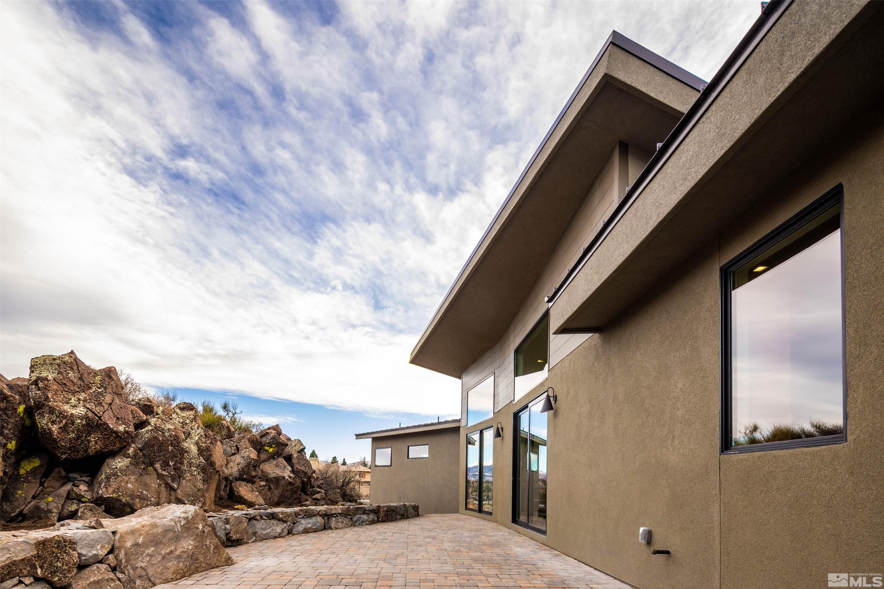 2331 Diamond J Place Reno, NV 89511 - Photo 22 of 25 a view of a house with a backyard