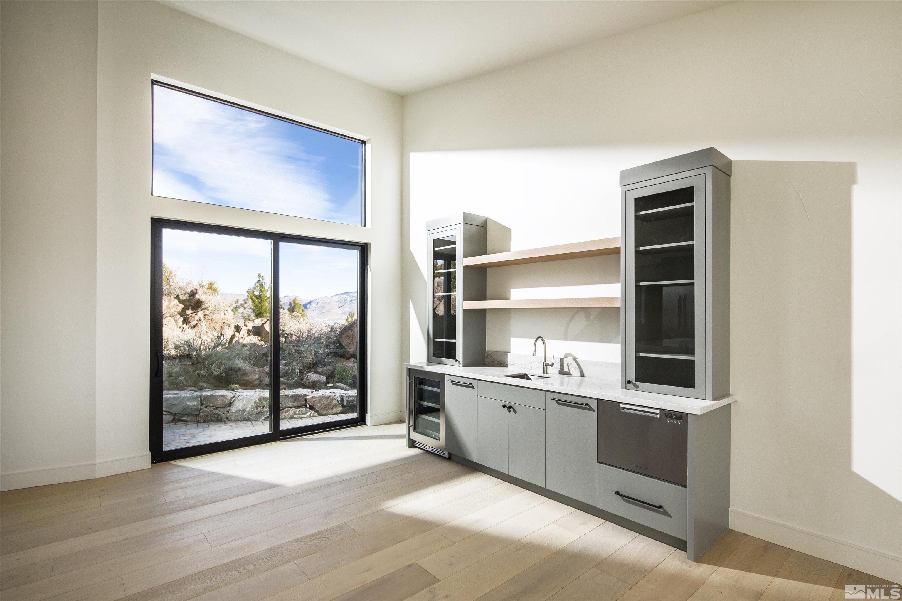 2331 Diamond J Place Reno, NV 89511 - Photo 3 of 25 a view of a kitchen with furniture and window