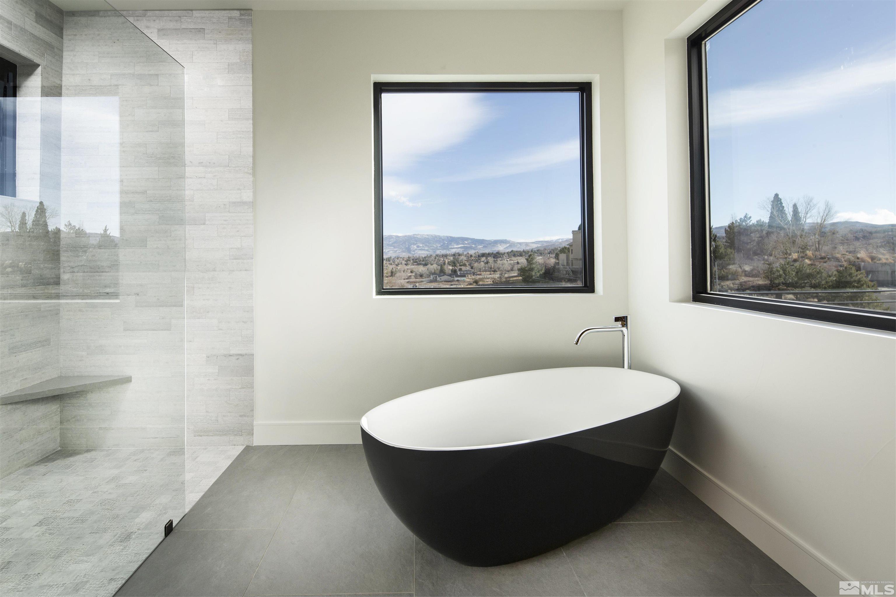 2331 Diamond J Place Reno, NV 89511 - Photo 8 of 25 a bathroom with a sink and a mirror