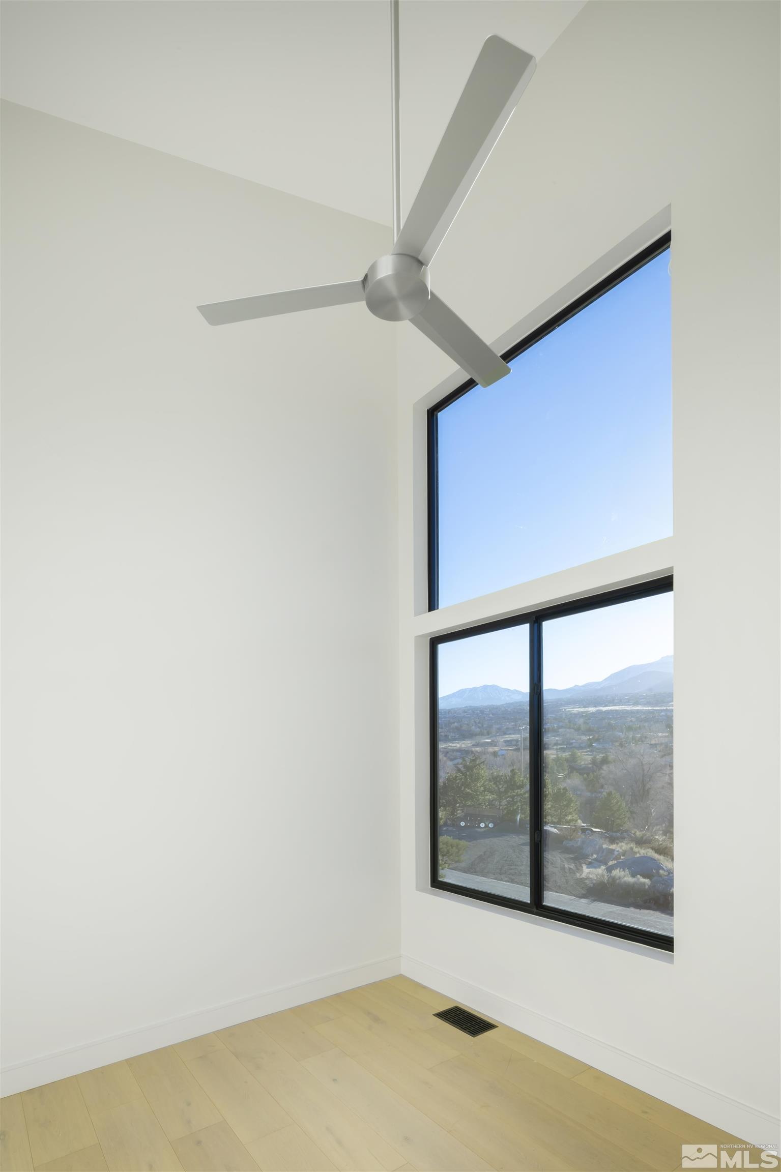 2331 Diamond J Place Reno, NV 89511 - Photo 10 of 25 an empty room with a window