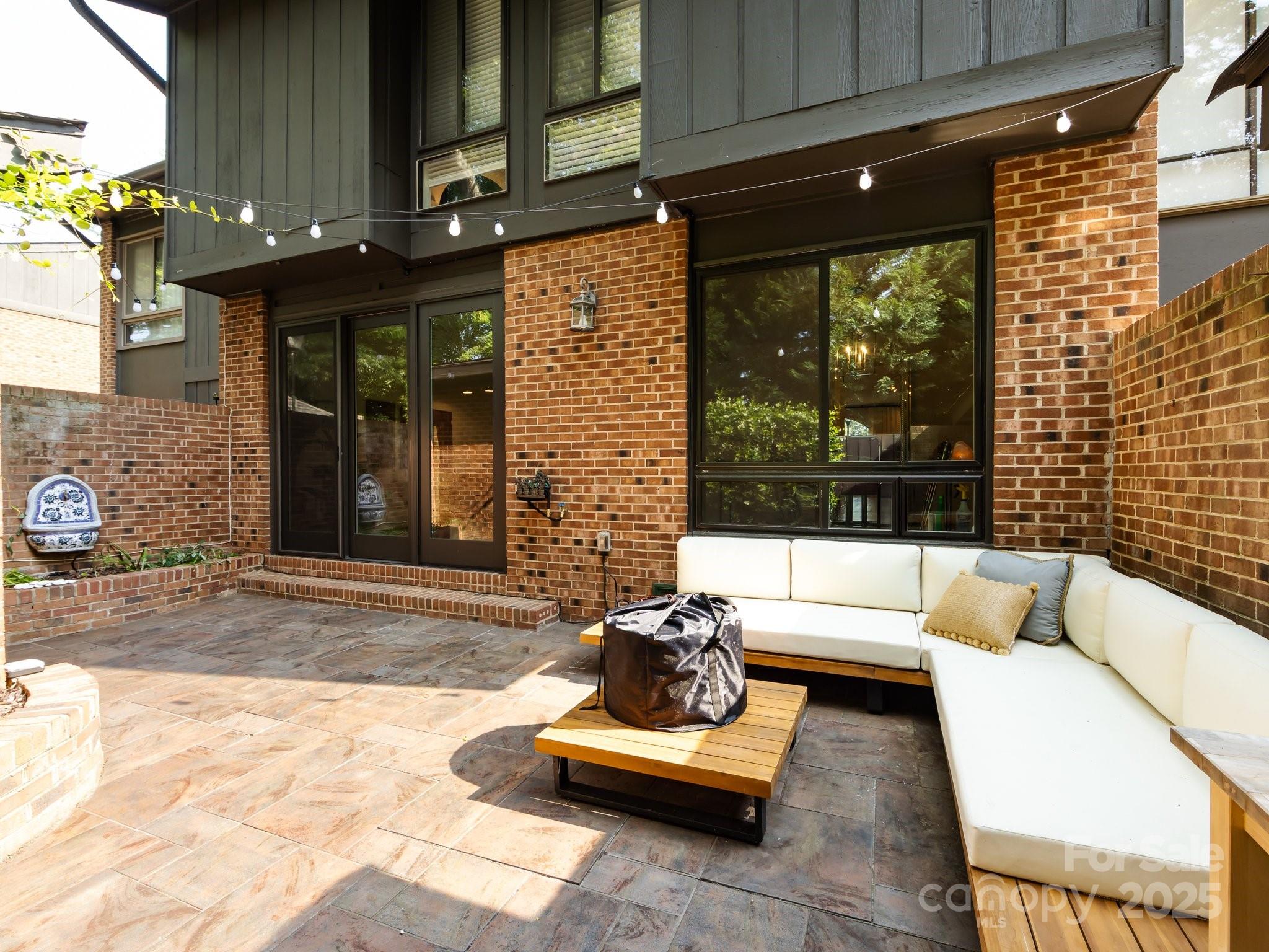 5809 Sharon Road, Unit G Charlotte, NC 28210 - Photo 21 of 25 a view of a lounge chair in the patio