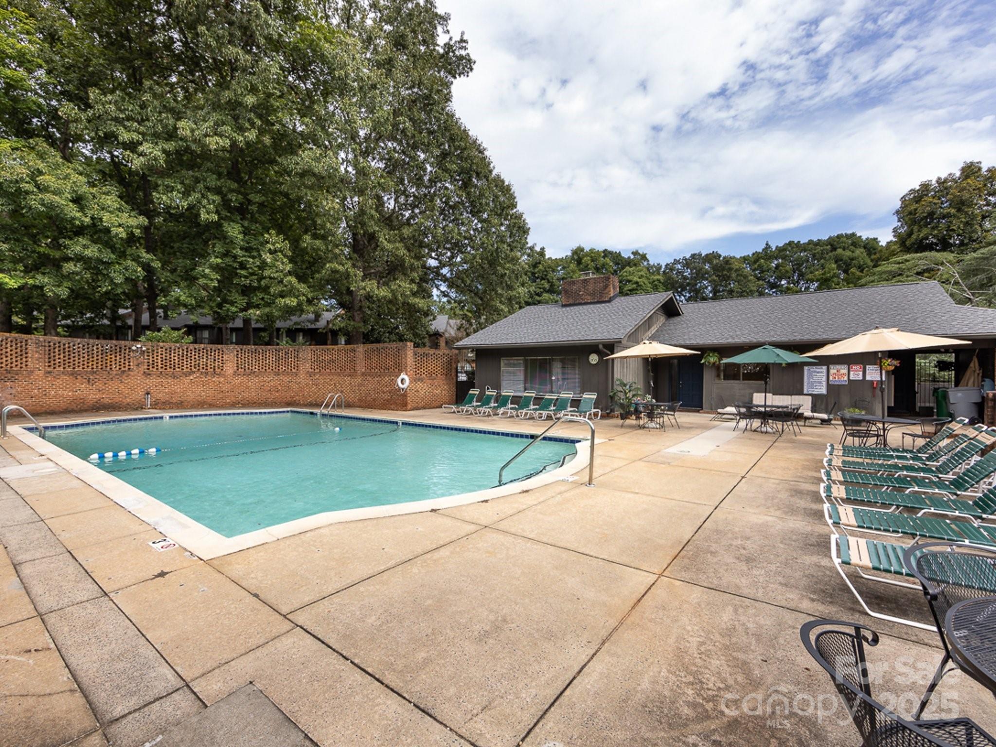 5809 Sharon Road, Unit G Charlotte, NC 28210 - Photo 22 of 25 a house view with a outdoor space