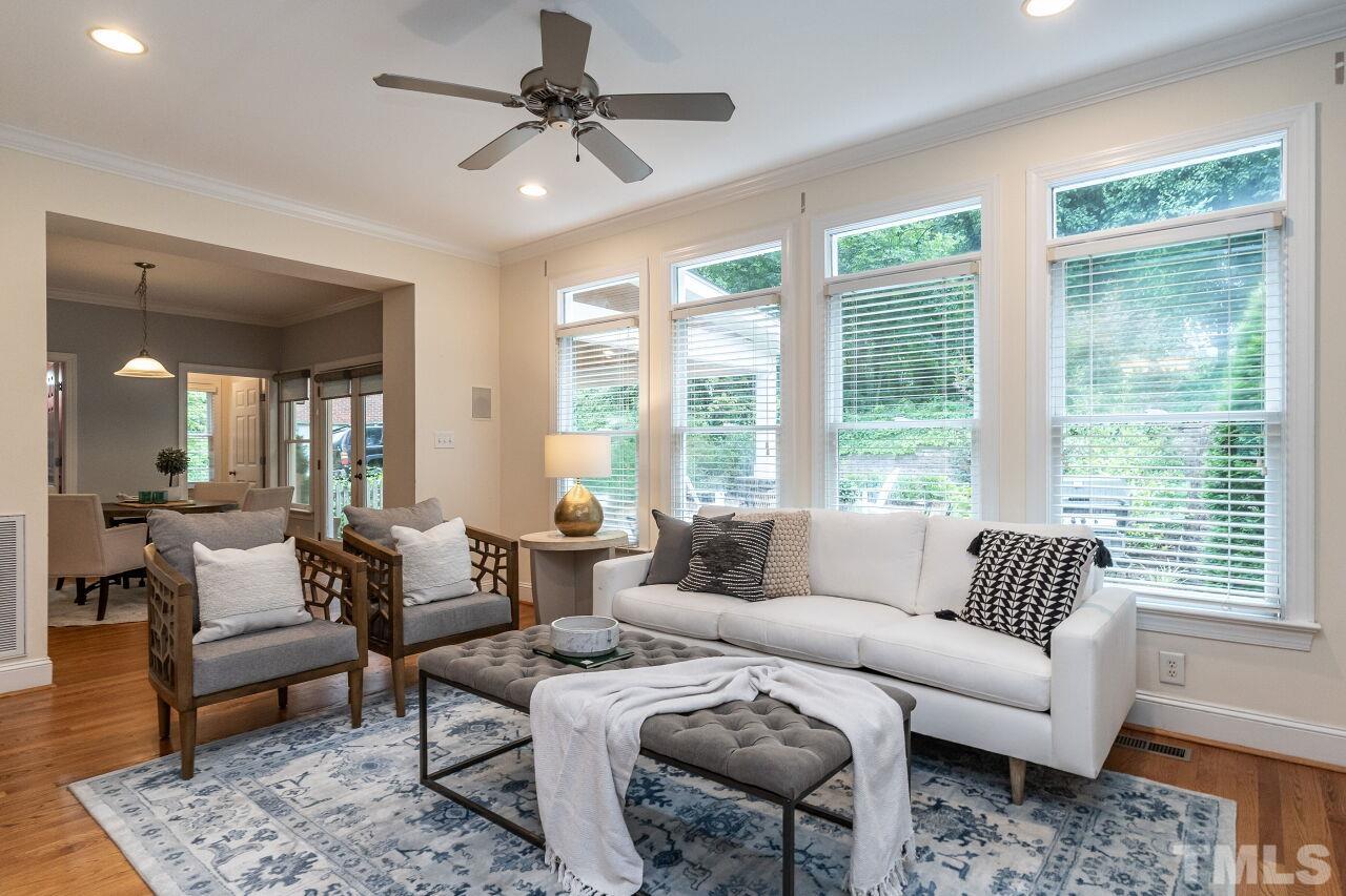 2730 Rothgeb Drive Raleigh, NC 27609 - Photo 12 of 43 a living room with furniture and a large window