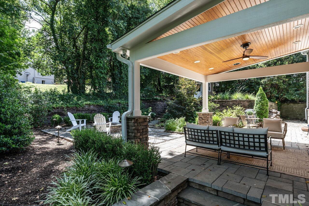 2730 Rothgeb Drive Raleigh, NC 27609 - Photo 40 of 43 a view of a chair and tables in the patio