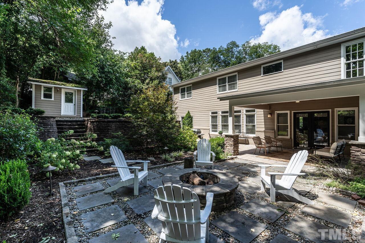 2730 Rothgeb Drive Raleigh, NC 27609 - Photo 42 of 43 a house view with a sitting space and garden space
