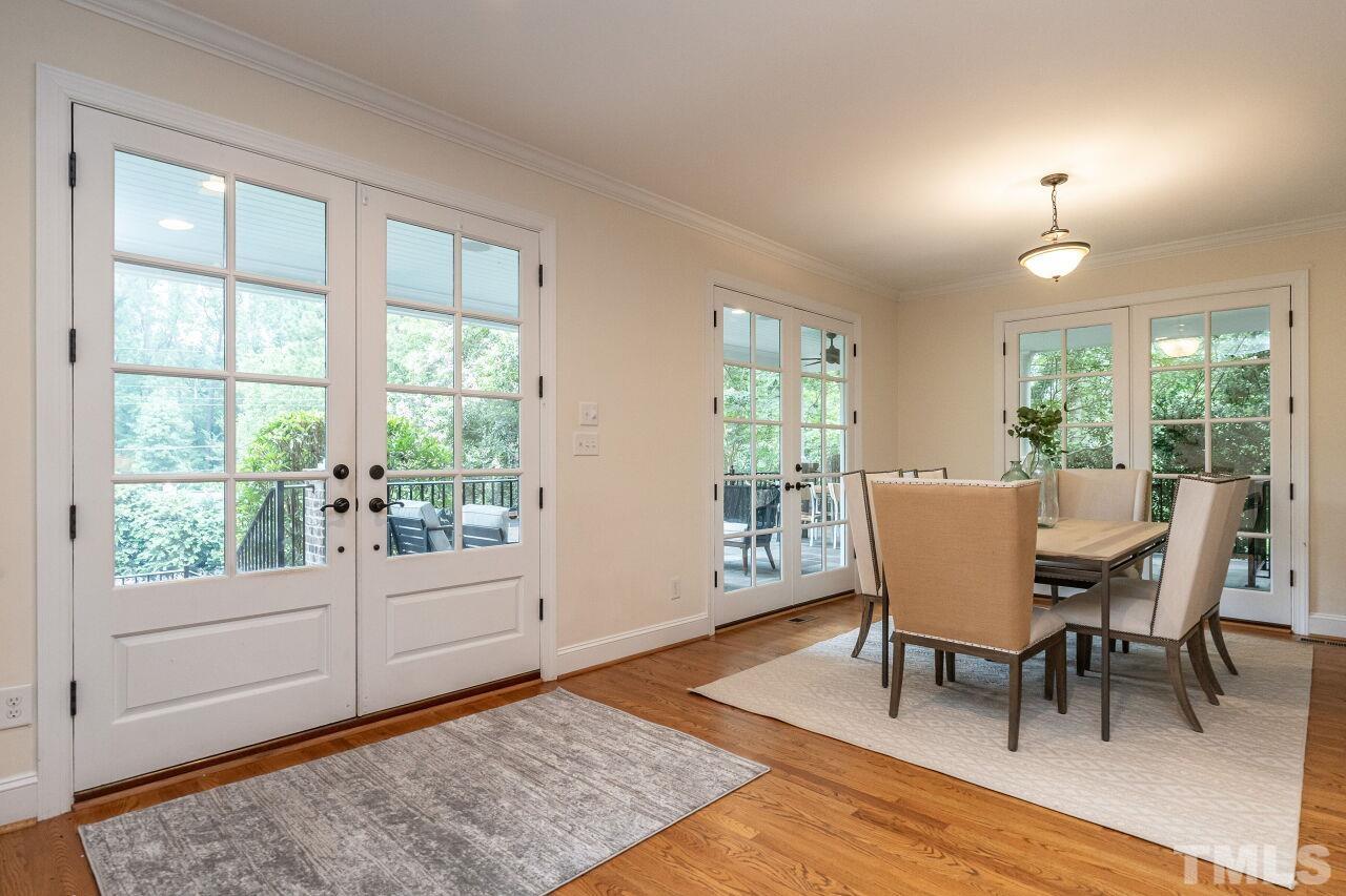 2730 Rothgeb Drive Raleigh, NC 27609 - Photo 6 of 43 a view of a dining room with furniture window and wooden floor