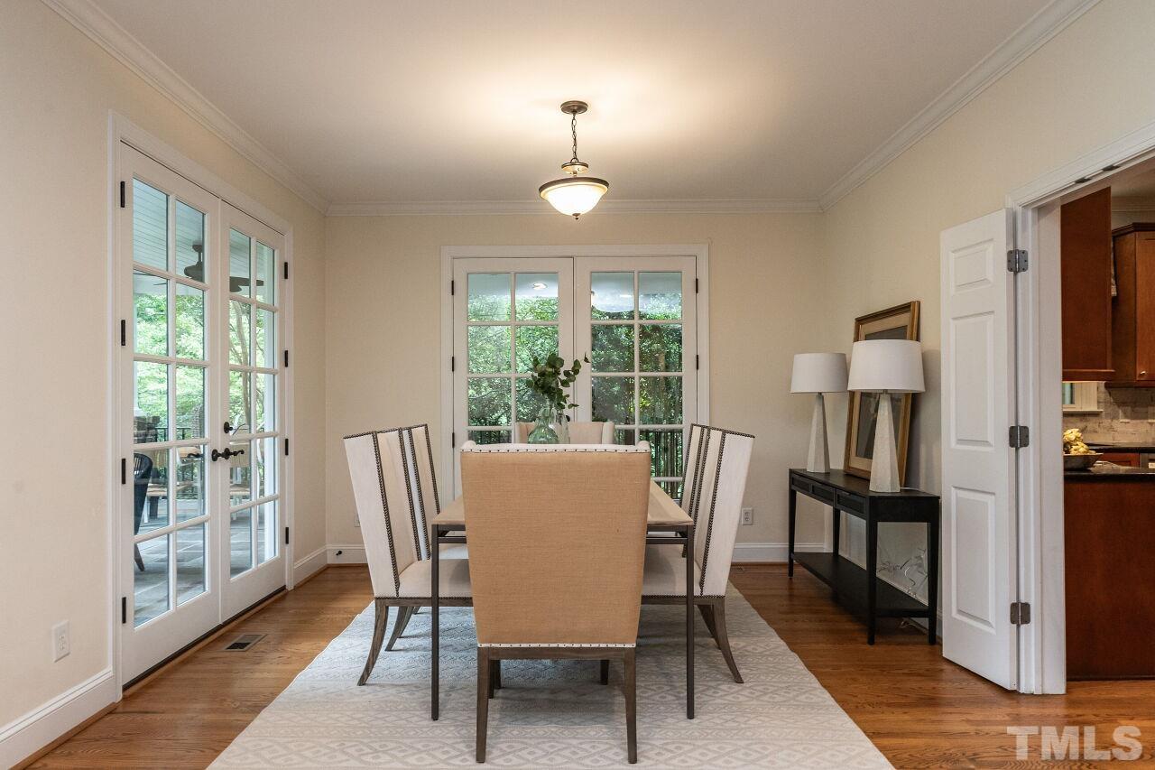 2730 Rothgeb Drive Raleigh, NC 27609 - Photo 7 of 43 a view of a dining room with furniture window and wooden floor