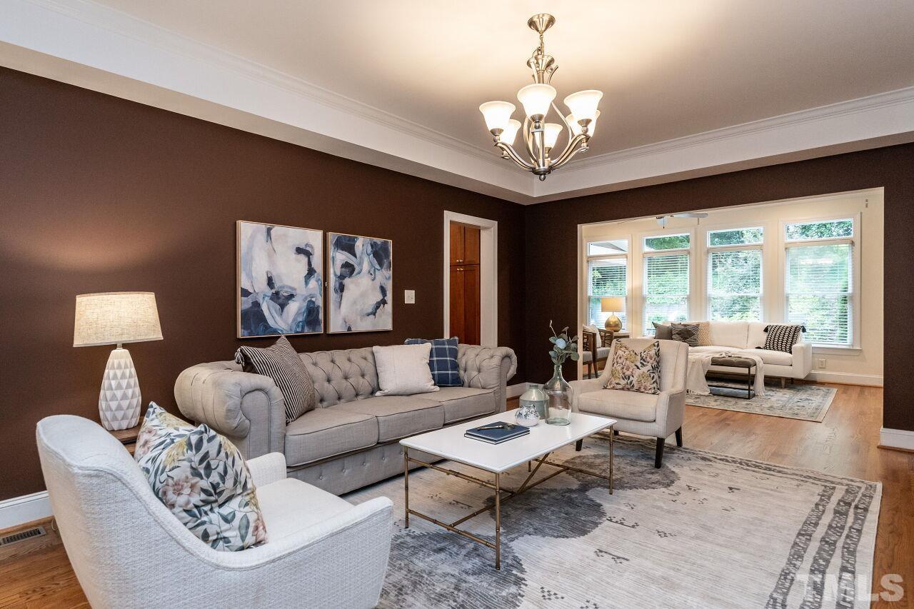 2730 Rothgeb Drive Raleigh, NC 27609 - Photo 10 of 43 a living room with furniture and a large window