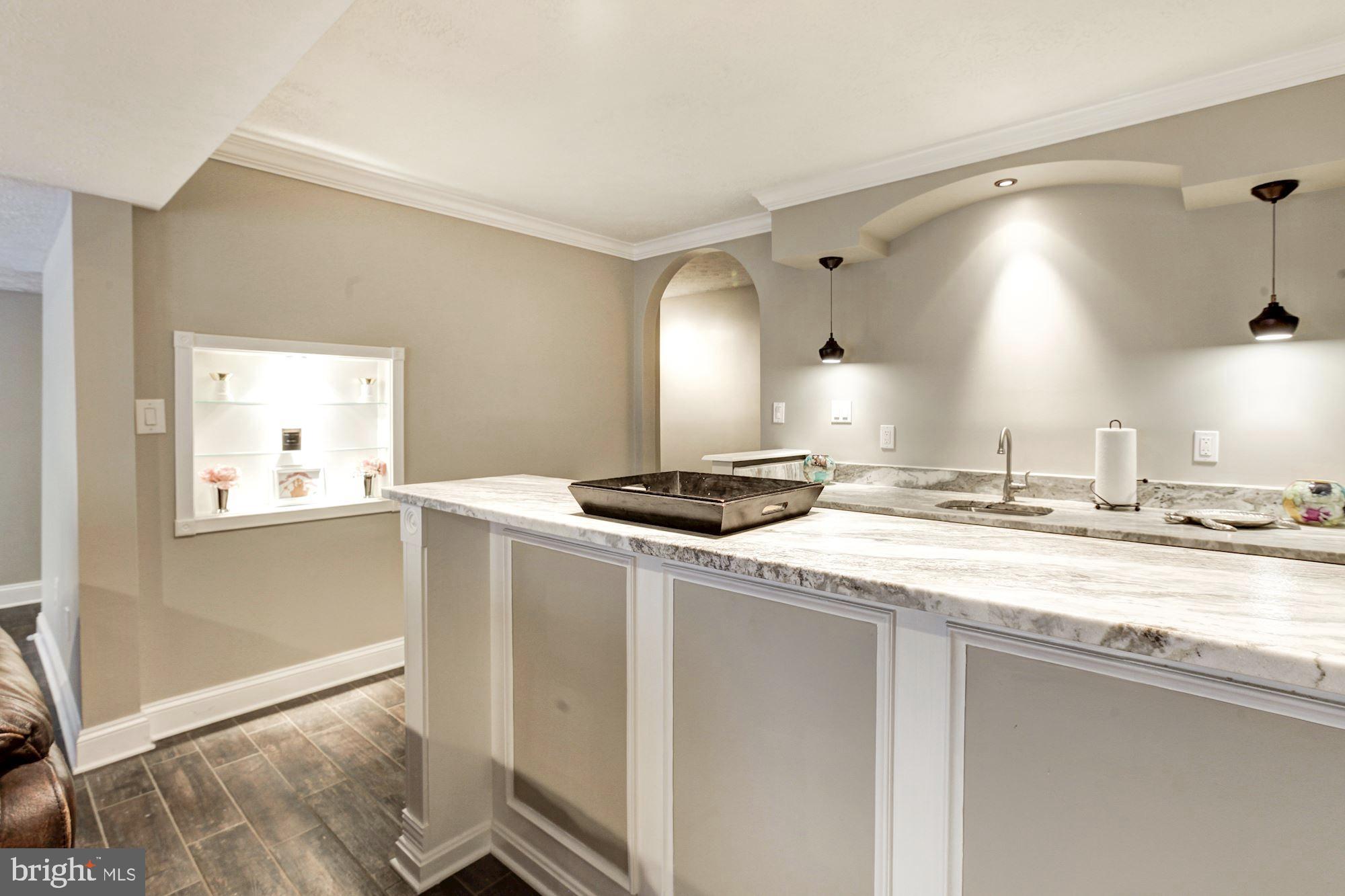 6422 Spring Forest Road Frederick, MD 21701 - Photo 26 of 37 Custom Bar in Basement