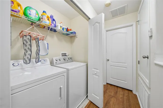 a utility room with dryer and washer