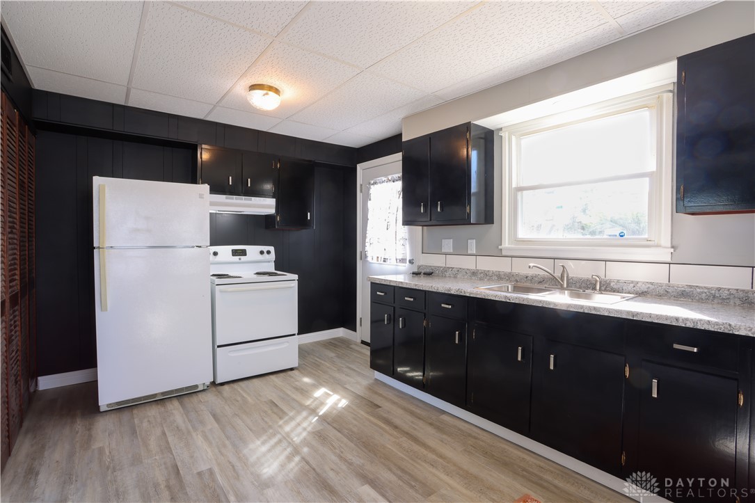 1627 Joselin Road Dayton, OH 45432 - Photo 9 of 28 Bright kitchen with ample cabinetry and generous counter space.