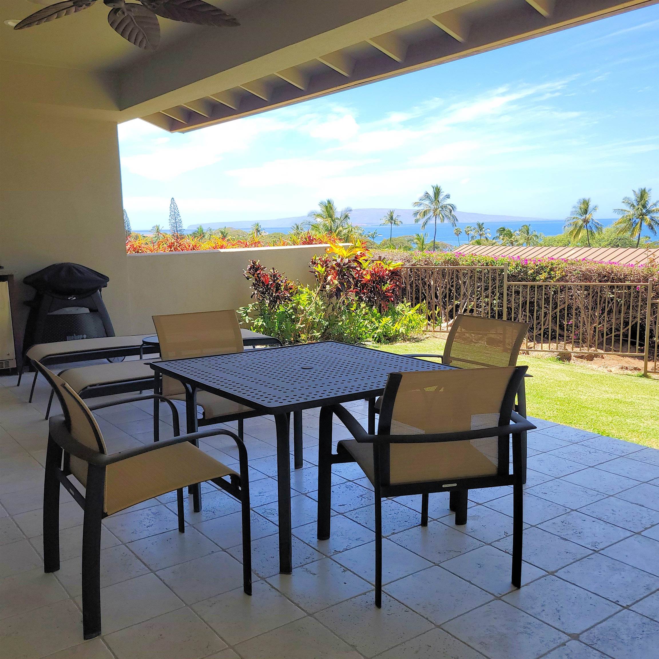 a view of a chairs and table on the terrace