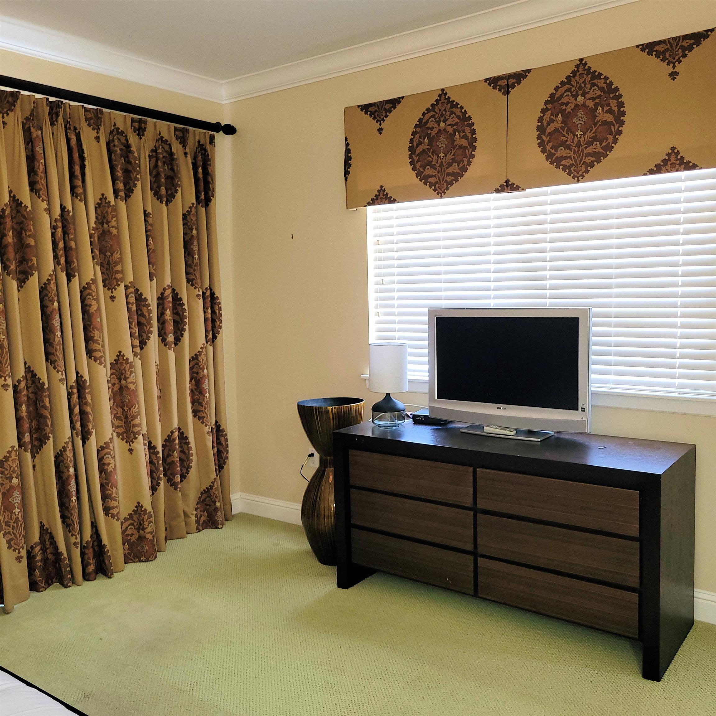 83 Kainehe Place, Unit 9B Kihei, HI 96753 - Photo 15 of 23 a living room with furniture and a fireplace
