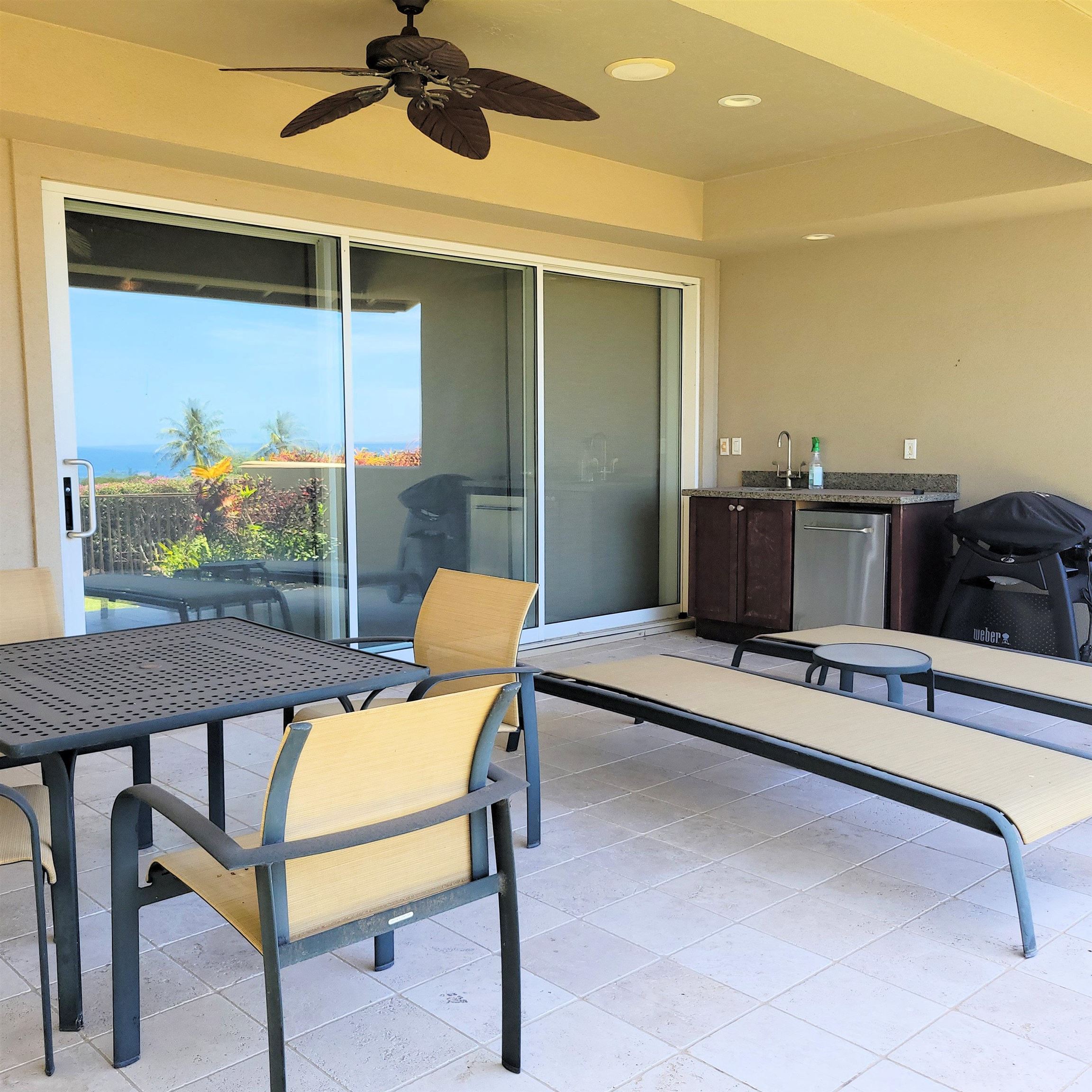 83 Kainehe Place, Unit 9B Kihei, HI 96753 - Photo 5 of 23 a view of a workspace with furniture and a window