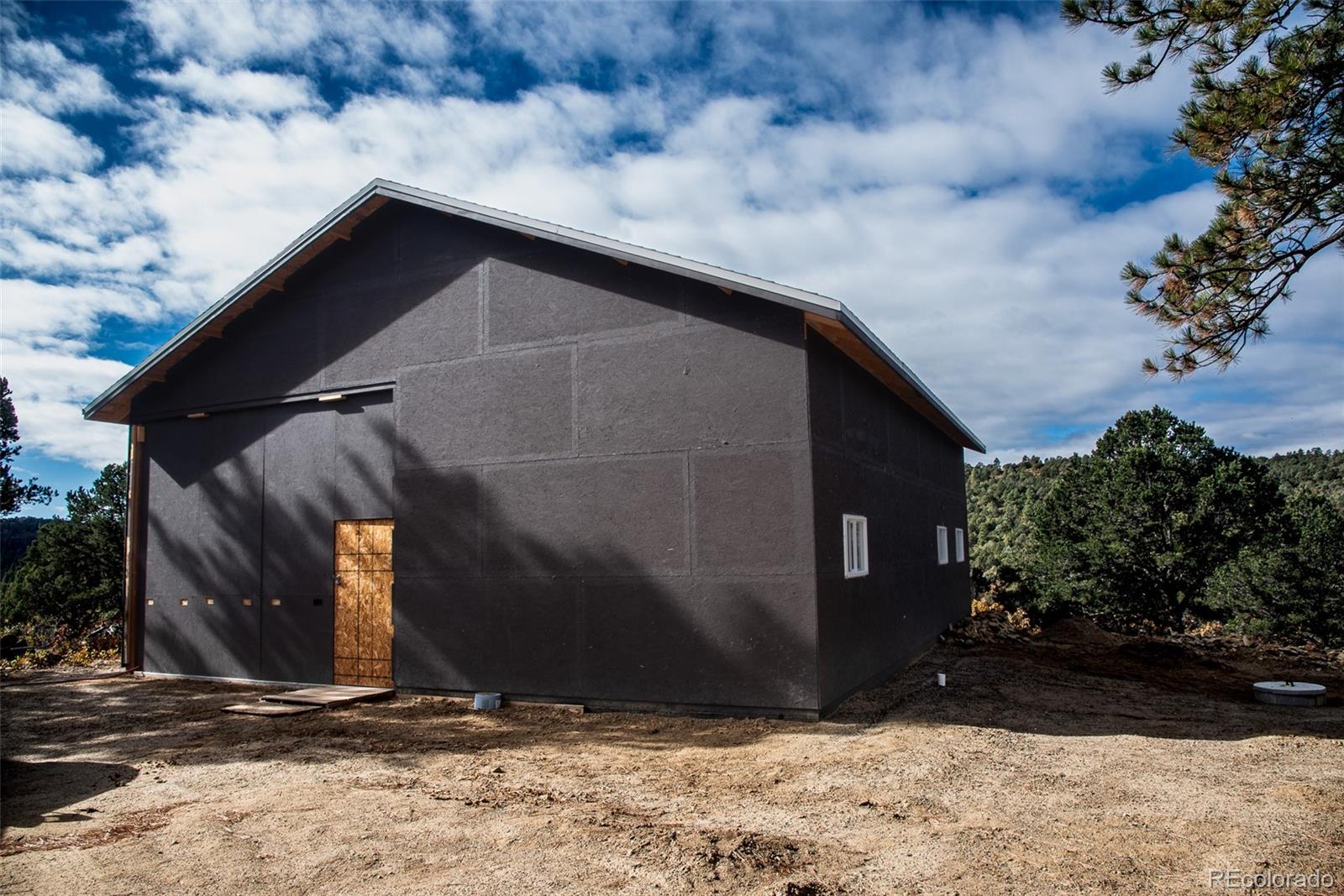 a house with trees in the background