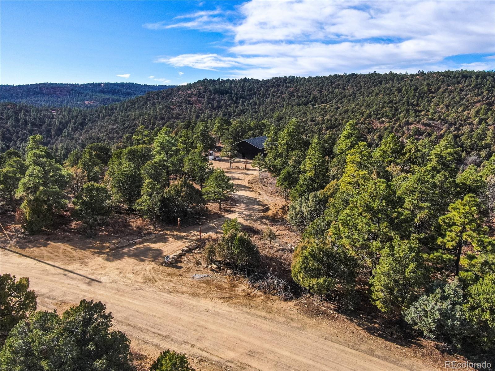 33191 Elk Park Road Trinidad, CO 81082 - Photo 27 of 33 a view of a yard with wooden fence