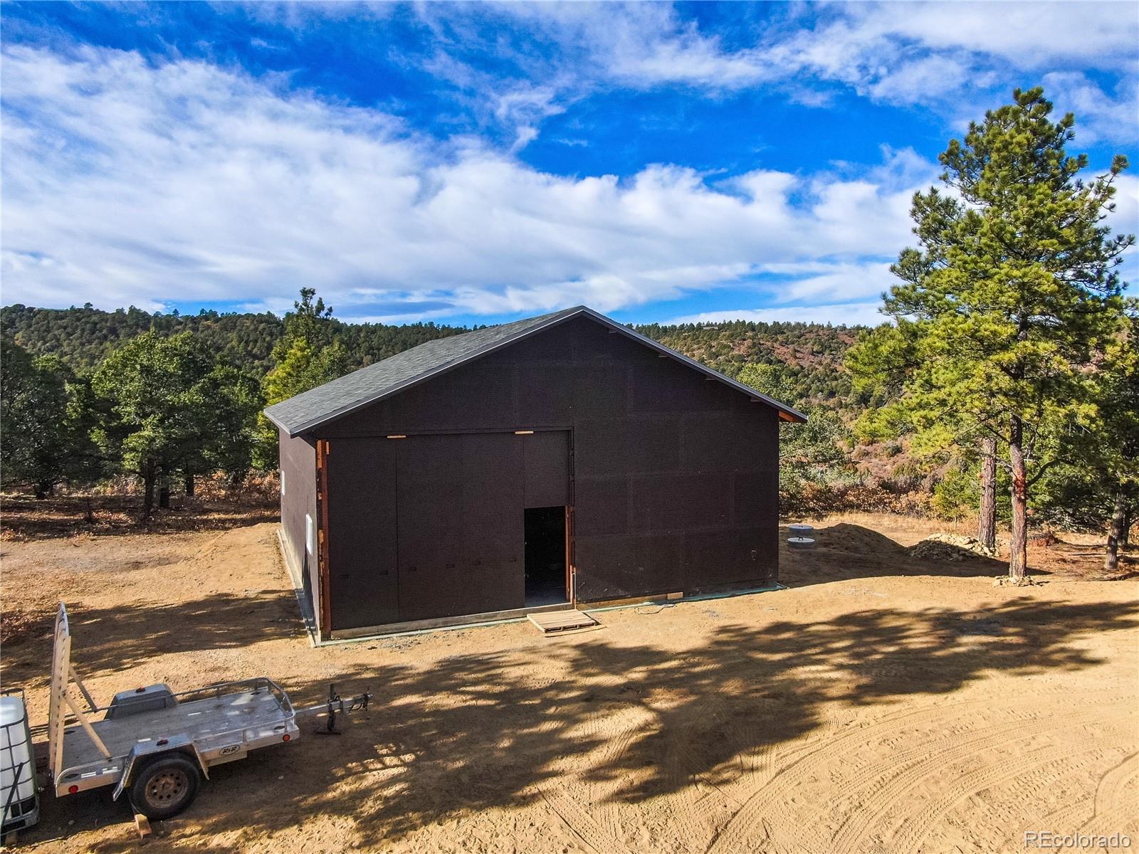 33191 Elk Park Road Trinidad, CO 81082 - Photo 32 of 33 a front view of a house with a yard