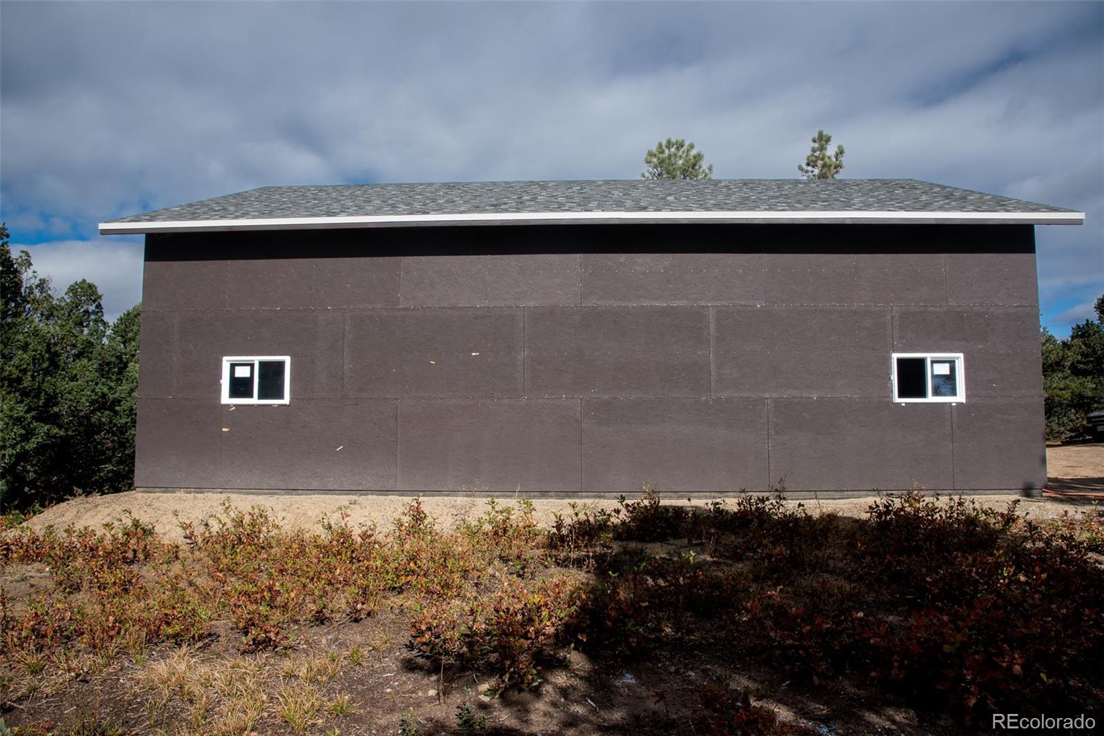 33191 Elk Park Road Trinidad, CO 81082 - Photo 9 of 20 a front view of a house with a yard