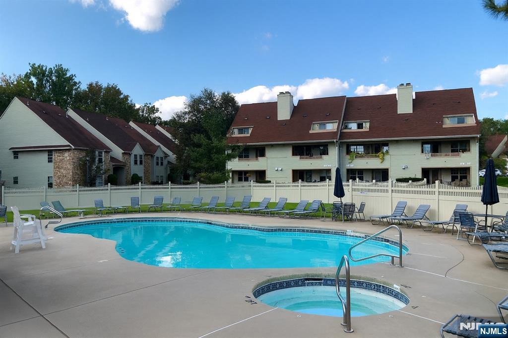 301 Tavistock Road Cherry Hill, NJ 08034 - Photo 12 of 14 a view of a house with swimming pool and sitting area
