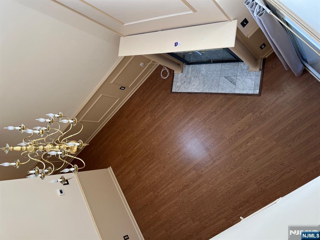 301 Tavistock Road Cherry Hill, NJ 08034 - Photo 4 of 14 a view of a room with wooden floor and potted plant