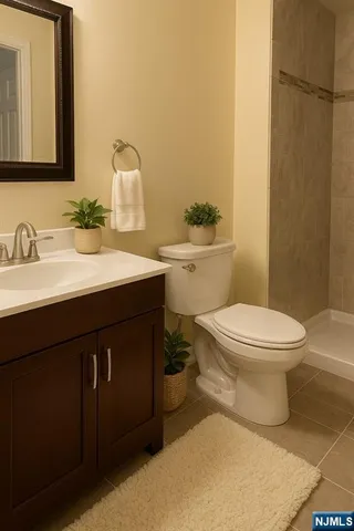 a bedroom with a bed and dresser