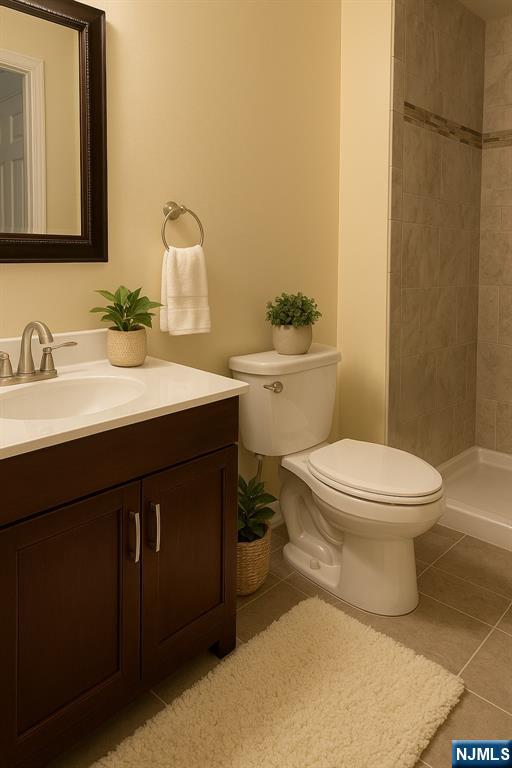 301 Tavistock Road Cherry Hill, NJ 08034 - Photo 8 of 14 a bathroom with a sink a toilet and mirror