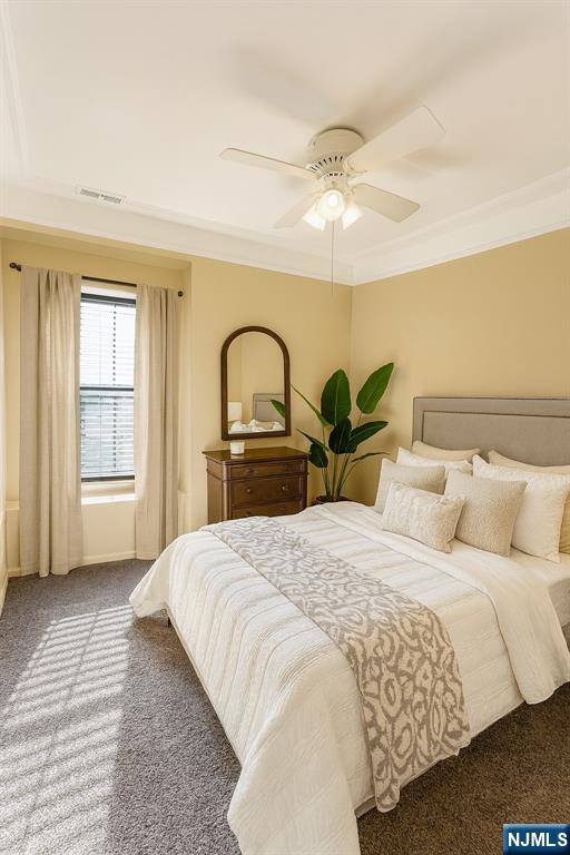 301 Tavistock Road Cherry Hill, NJ 08034 - Photo 9 of 14 a bedroom with a bed and dresser