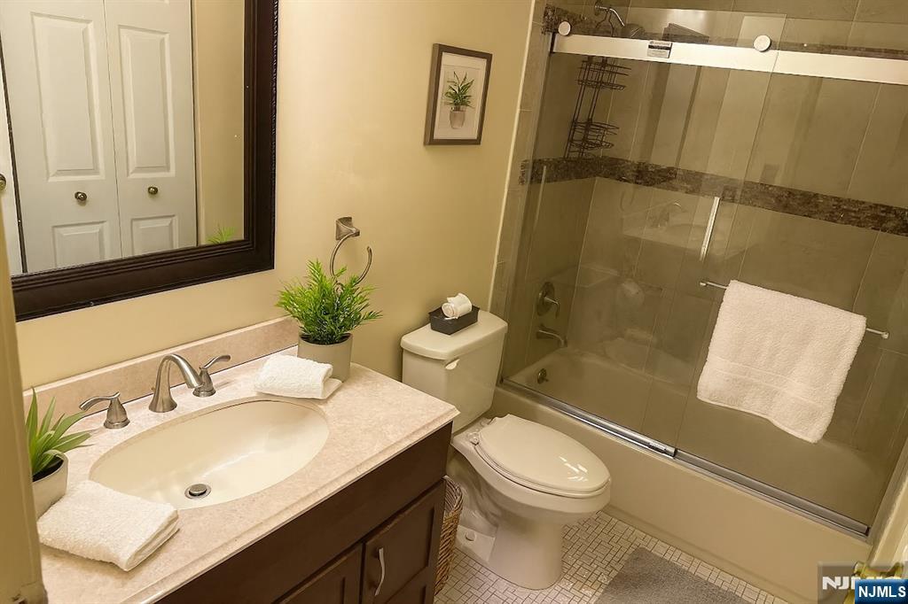 301 Tavistock Road Cherry Hill, NJ 08034 - Photo 10 of 14 a bathroom with a sink toilet and shower