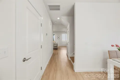 a view of a bathroom from the hallway