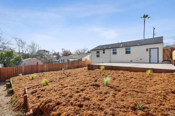 aerial view of a house with a outdoor space
