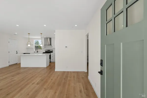 a view of kitchen with wooden floor