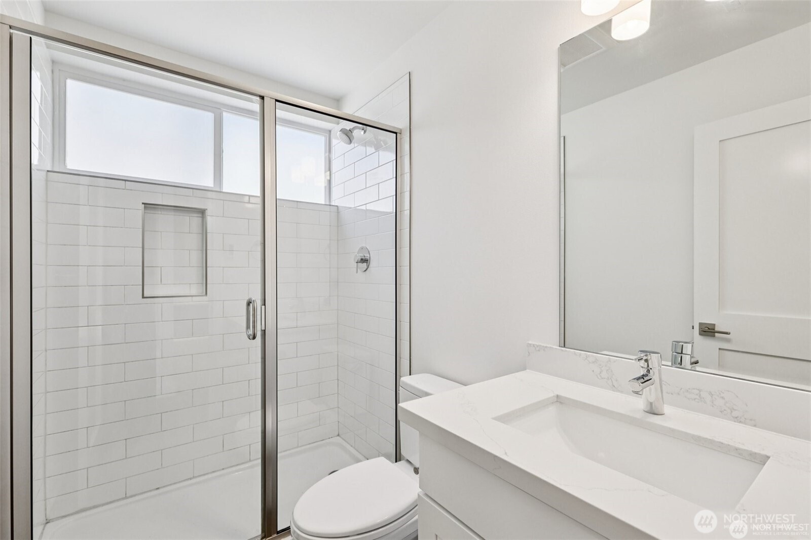 5259 Brooklyn Avenue Northeast Seattle, WA 98105 - Photo 28 of 40 a bathroom with a sink toilet and shower