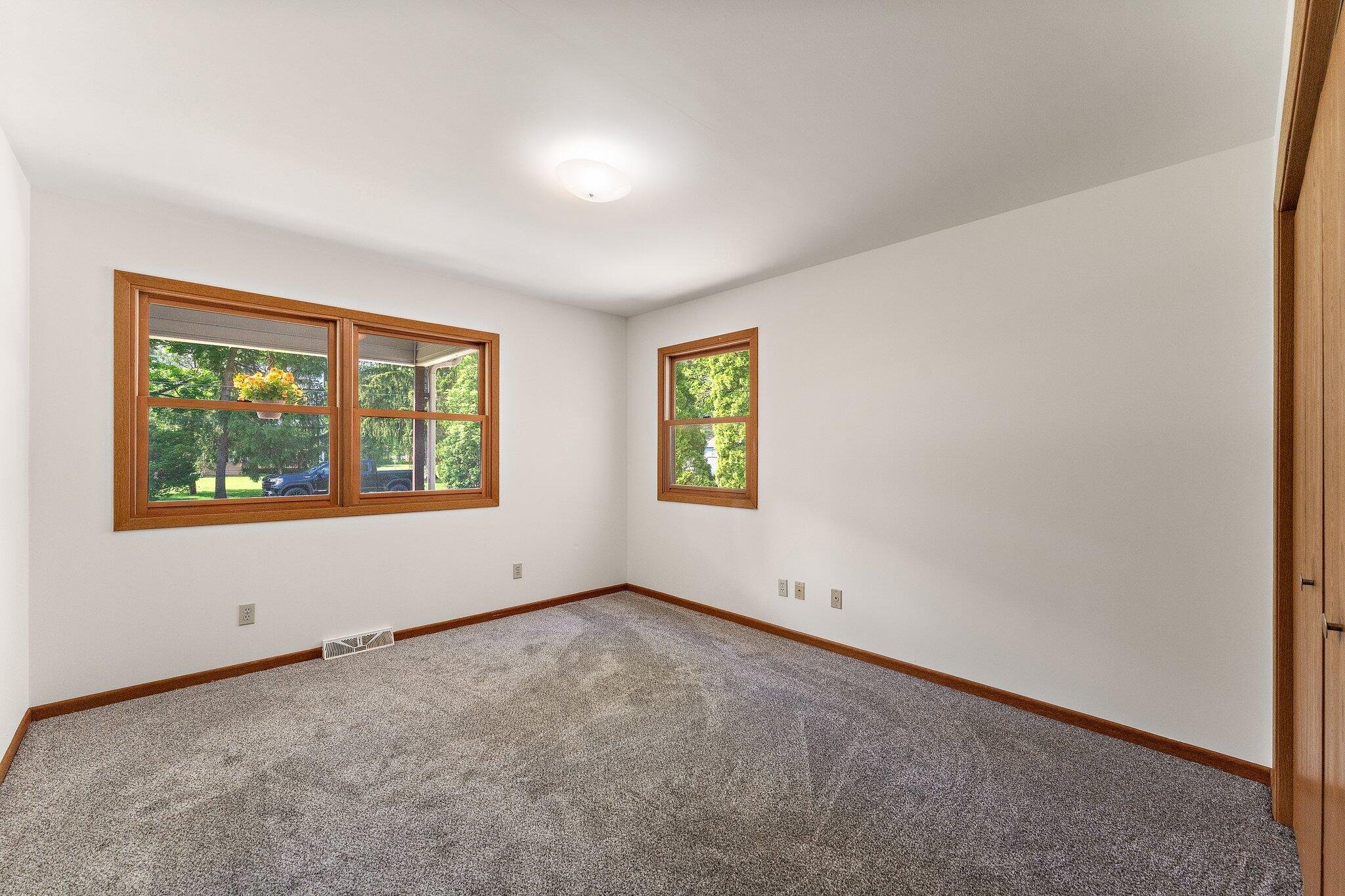 402 Alice Street Kouts, IN 46347 - Photo 12 of 21 an empty room with windows
