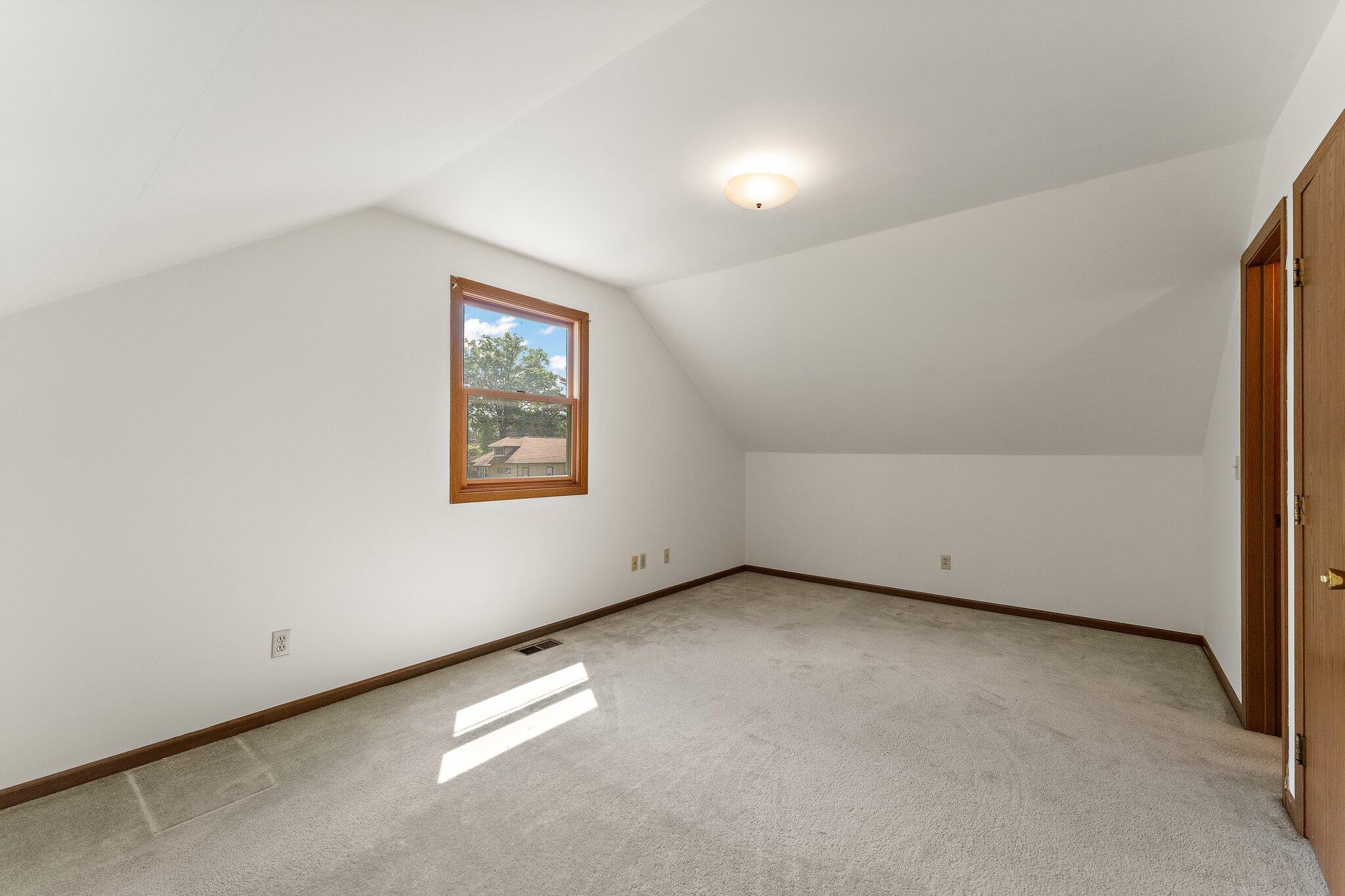 402 Alice Street Kouts, IN 46347 - Photo 13 of 21 an empty room with windows