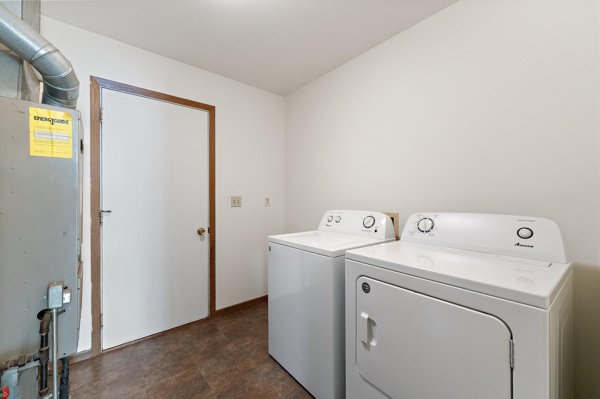 402 Alice Street Kouts, IN 46347 - Photo 15 of 21 a utility room with dryer and washer