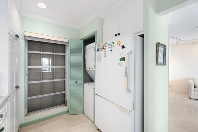 a bedroom with a bed and a table