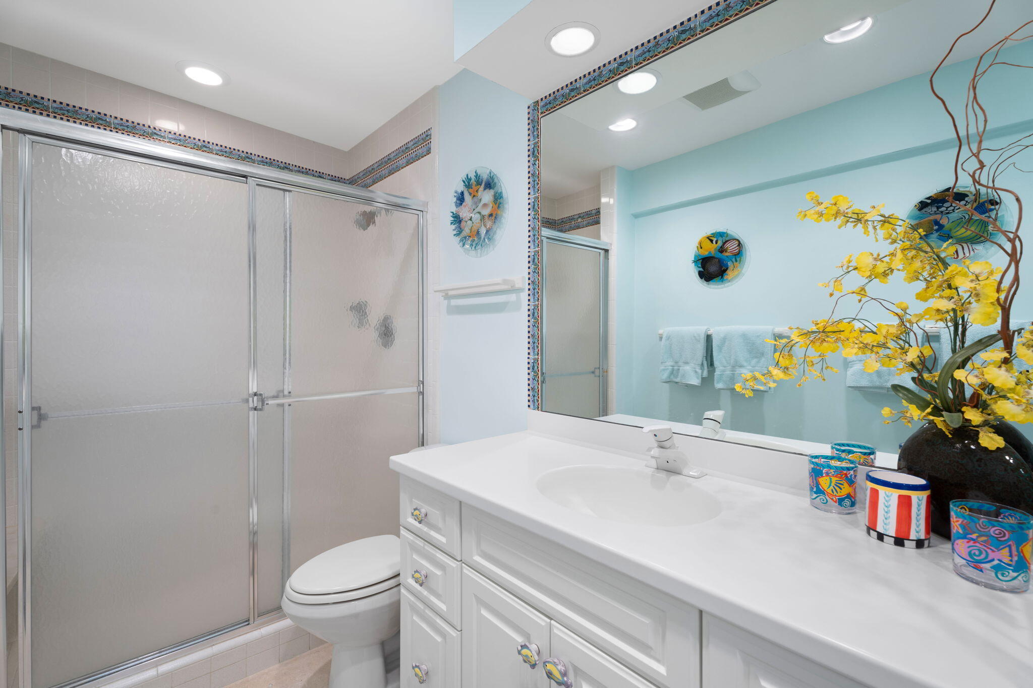 371 Wilma Circle, Unit 5 Riviera Beach, FL 33404 - Photo 16 of 43 a bathroom with a sink and a mirror
