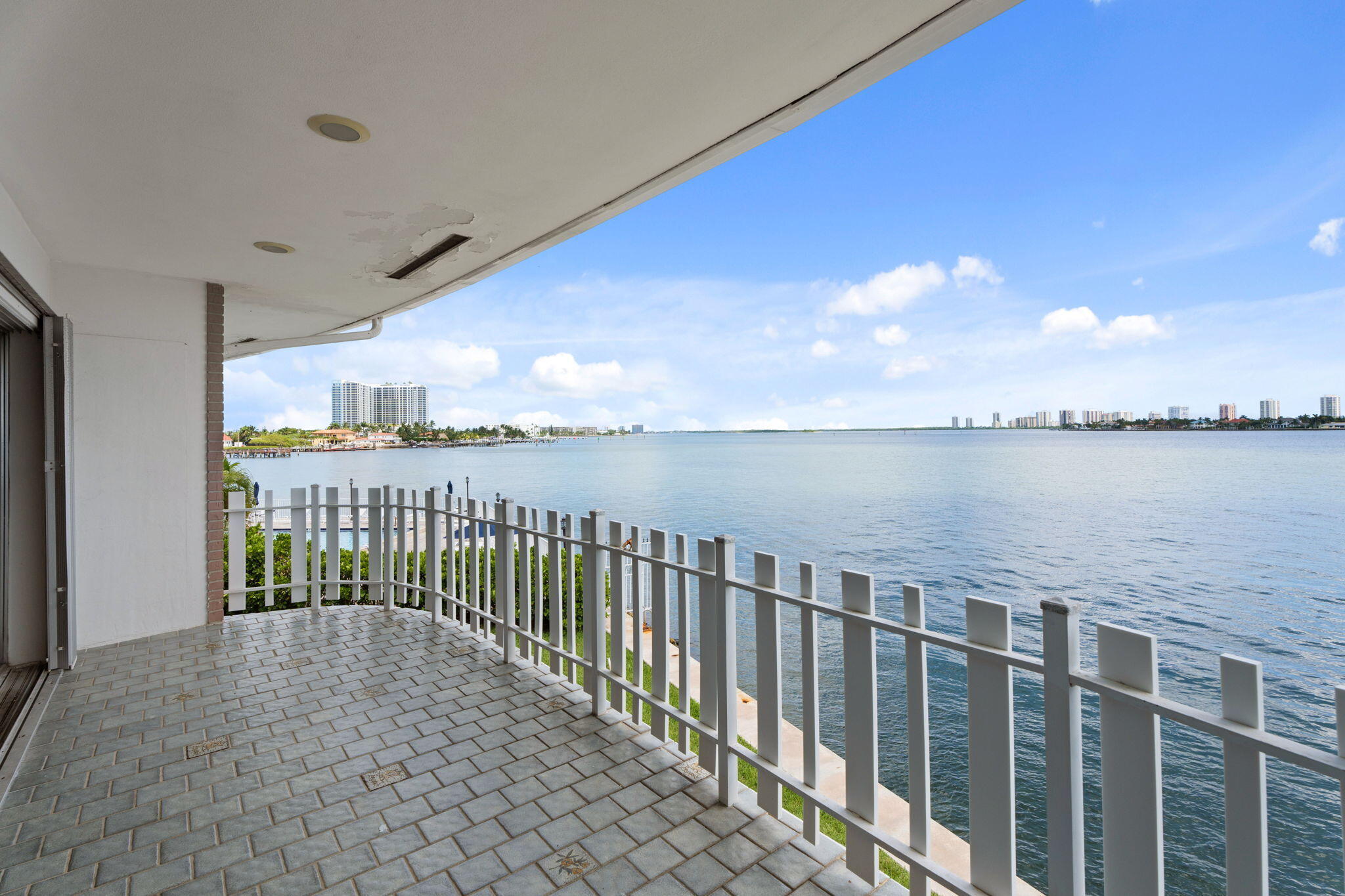 371 Wilma Circle, Unit 5 Riviera Beach, FL 33404 - Photo 2 of 43 a view of balcony with city view