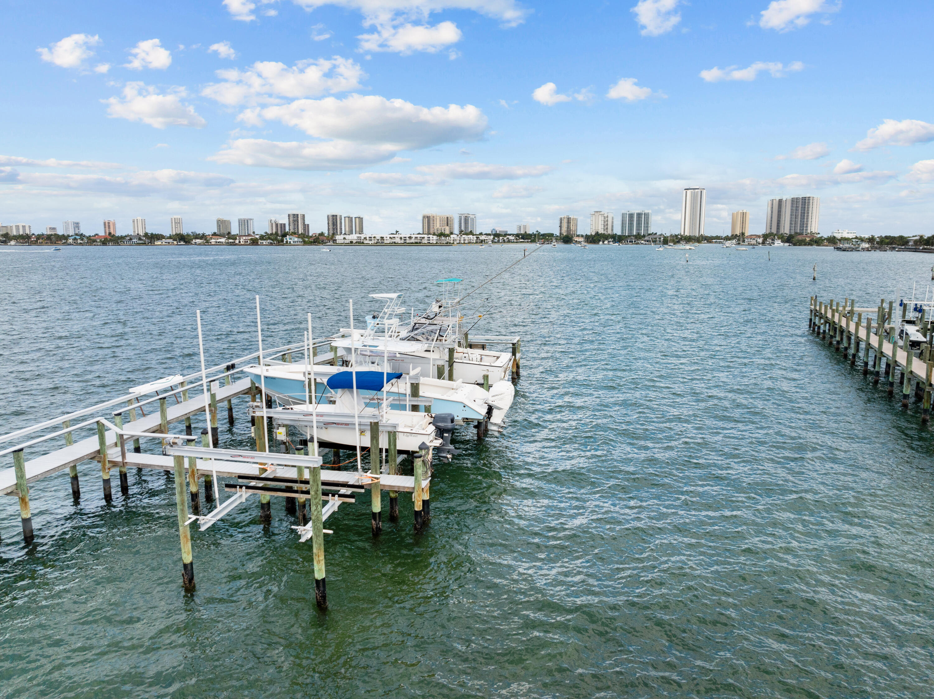 371 Wilma Circle, Unit 5 Riviera Beach, FL 33404 - Photo 26 of 43 a terrace with outdoor seating and city view
